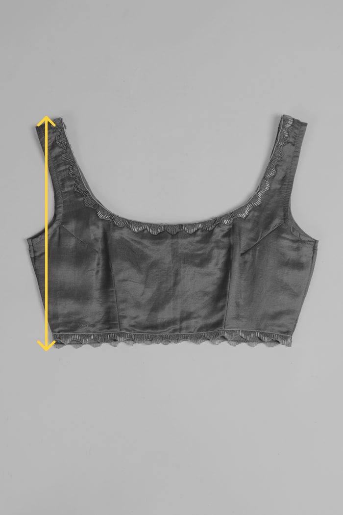 Measure blouse length from top of shoulder to bottom hem