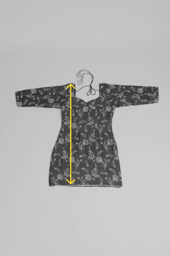 Measure suit top length from top of shoulder to bottom hem